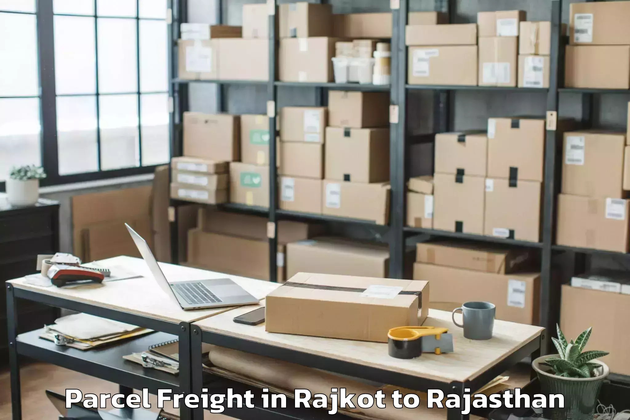 Expert Rajkot to Lachhmangarh Parcel Freight